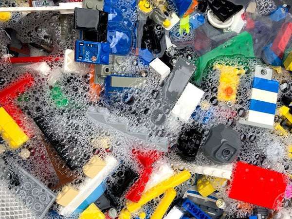 Pre-owned LEGO bricks washed in soapy water.